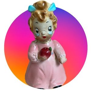 Vintage figurine school teacher holding an apple